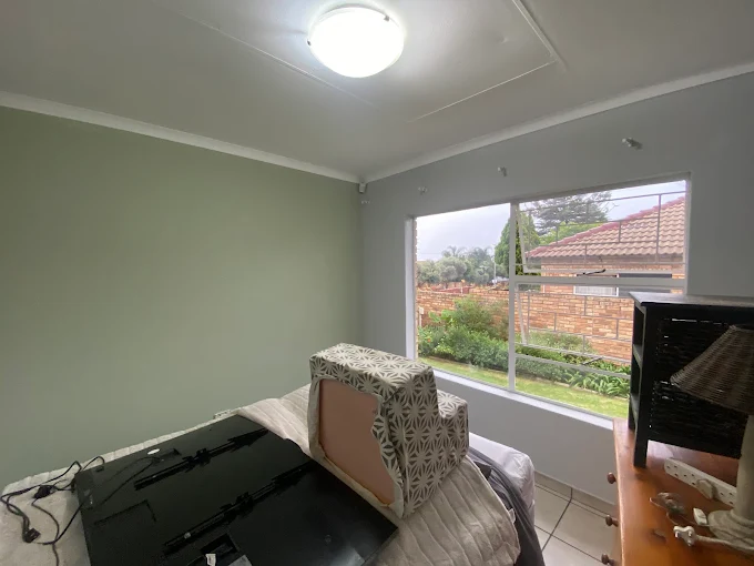Illustrative freshly painted bedroom wall
